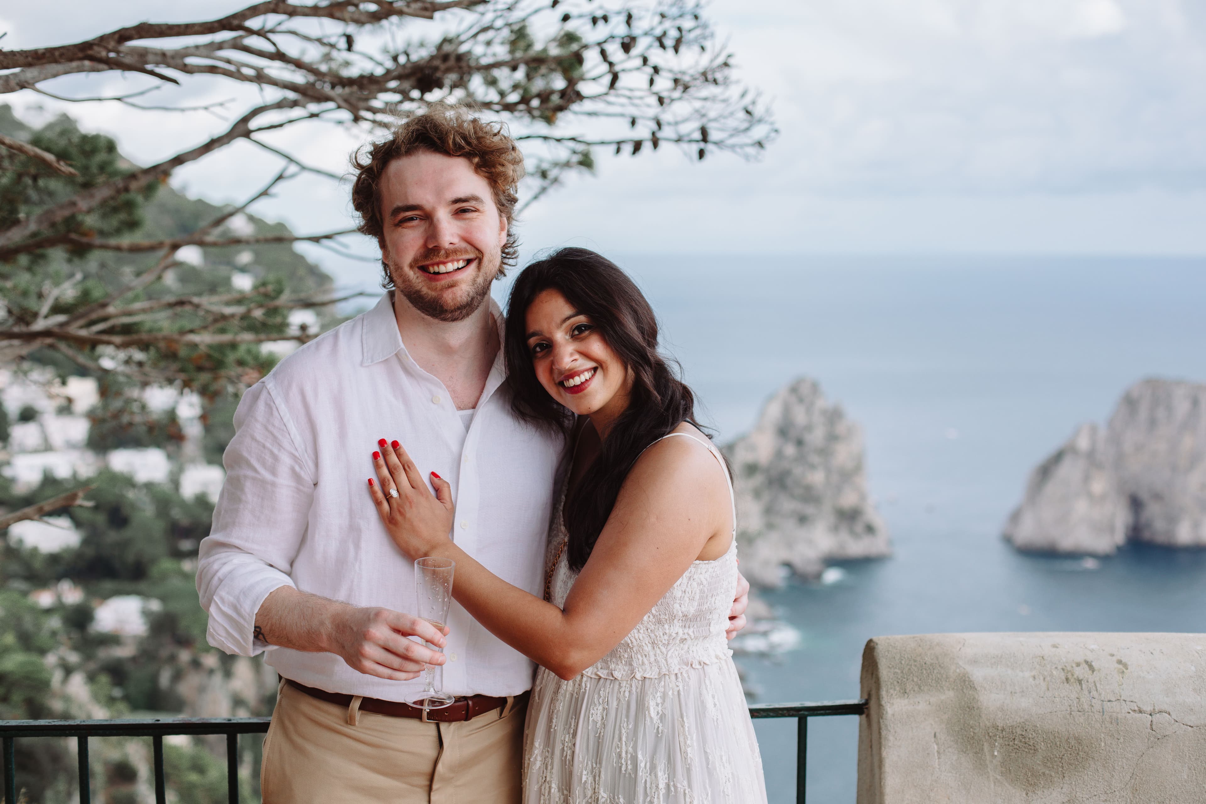 Ben and Saba on a terrace overlooking the sea in Capri
